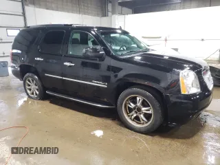 2009 GMC Yukon Denali z VIN 1GKFK03279R282409, wystawiony jako Copart lot #51534755 z przebiegiem 197 150 mil mil oraz Tytuł czysty. Historia ofert i sprzedaży dostępna na DreamBid. Obrazek 4.