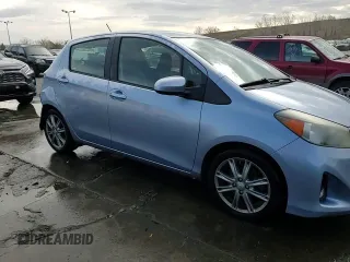 2013 Toyota Yaris L with VIN JTDKTUD30DD563690, listed as a Copart auction lot 50710715 with 98,331 mi miles and Salvage Title. Bid and sale history available at DreamBid. Image 14.