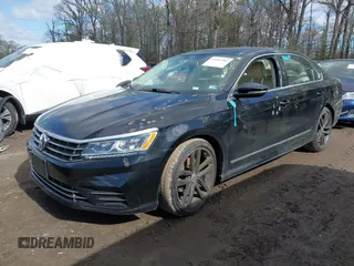 2016 Volkswagen Passat 1.8T S with VIN 1VWAT7A34GC068563, listed as a IAAI auction lot 41983202 with 60,562 mi miles. Bid and sale history available at carsss.com. Image 2.