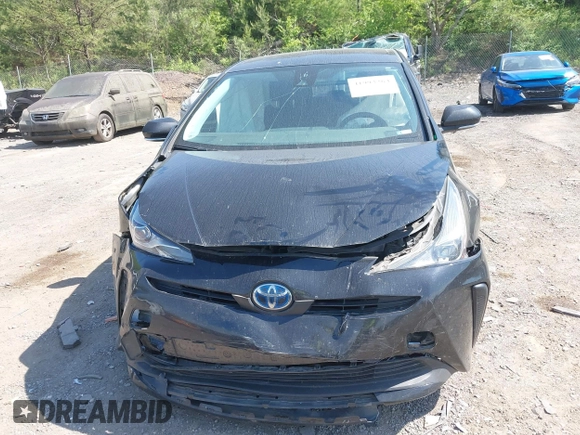 2022 Toyota Prius L Eco with VIN JTDKAMFU1N3182790, listed as a IAAI auction lot 41993264 with 124,777 mi miles and . Bid and sale history available at DreamBid. Image 6.