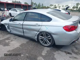 2018 BMW 4 Series 440i with VIN WBA4J5C57JBF07227, listed as a IAAI auction lot 41562986 with 76,316 mi miles and . Bid and sale history available at DreamBid. Image 6.