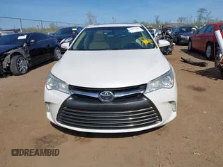 2015 Toyota Camry XLE with VIN 4T1BF1FK1FU977554, listed as a IAAI auction lot 42083589 with 104,811 mi miles and . Bid and sale history available at DreamBid. Image 13.
