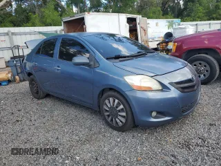 2009 Toyota Yaris z VIN JTDBT903X91297199, wystawiony jako Copart lot #57088615 z przebiegiem 161 170 mil mil oraz Szkody całkowita. Historia ofert i sprzedaży dostępna na DreamBid. Obrazek 4.