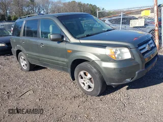 2006 Honda Pilot EX z VIN 2HKYF18466H515739, wystawiony jako IAAI lot #42065462 z przebiegiem Nie podano mil oraz . Historia ofert i sprzedaży dostępna na DreamBid. Obrazek 1.
