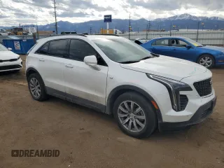 2022 Cadillac XT4 FWD Sport z VIN 1GYFZER47NF165920, wystawiony jako Copart lot #50389935 z przebiegiem 57 410 mil mil oraz Szkoda całkowita • Salvage title. Historia ofert i sprzedaży dostępna na DreamBid. Obrazek 4.