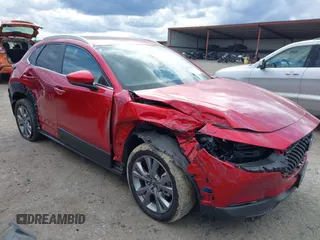 2024 Mazda CX-30 S Carbon Edition с VIN 3MVDMBCM6RM627083, выставлен на аукционе IAAI как лот 41715241 с пробегом 23 855 миль миль и . История ставок и продаж доступна на DreamBid. Изображение 1.