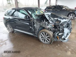 2018 BMW X3 xDrive30i with VIN 5UXTR9C58JLC76989, listed as a IAAI auction lot 41852158 with 76,202 mi miles. Bid and sale history available at carsss.com. Image 1.