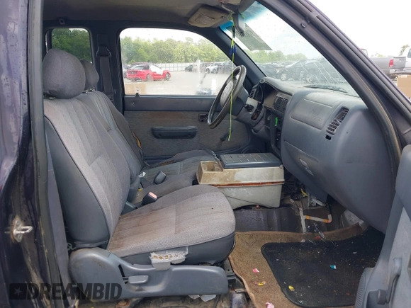 1999 Toyota Tacoma with VIN 4TAVL52N6XZ531014, listed as a IAAI auction lot 42170633 with 308,366 mi miles and . Bid and sale history available at DreamBid. Image 5.
