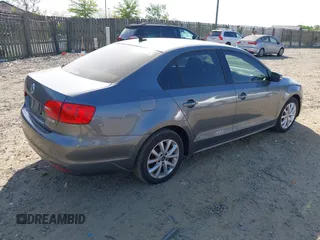 2012 Volkswagen Jetta Sedan SE w/Convenience PZEV with VIN 3VWDP7AJ4CM300149, listed as a IAAI auction lot 42116256 with 111,681 mi miles. Bid and sale history available at carsss.com. Image 4.