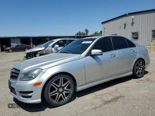 2014 Mercedes-Benz C 250 Sport with VIN WDDGF4HB2EG221050, listed as a Copart auction lot 64233785 with 130,746 mi miles and Salvage title. Bid and sale history available at DreamBid. Image 1.