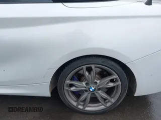 2015 BMW 2 Series M235i with VIN WBA1M1C53FV393300, listed as a IAAI auction lot 41926019 with 180,949 mi miles and . Bid and sale history available at carsss.com. Image 19.