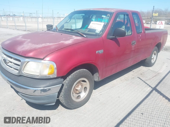 2000 Ford F-150 XL with VIN 1FTZX172XYNC36332, listed as a IAAI auction lot 41699806 with 278,119 mi miles. Bid and sale history available at carsss.com. Image 2.
