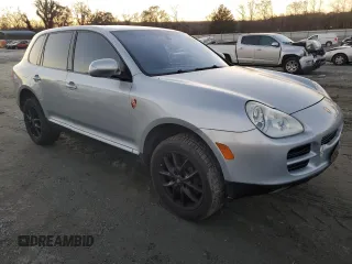 2004 Porsche Cayenne S with VIN WP1AB29P54LA69022, listed as a Copart auction lot 84456184 with 215,112 mi miles and Salvage Title. Bid and sale history available at carsss.com. Image 4.
