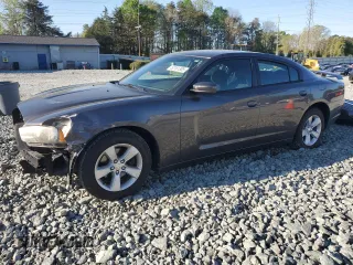 2014 Dodge Charger SXT with VIN 2C3CDXHG7EH238396, listed as a Copart auction lot 52181305 with 129,599 mi miles and Salvage Title. Bid and sale history available at carsss.com. Image 1.