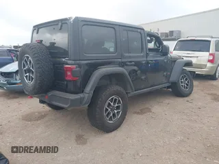2024 Jeep Wrangler Rubicon with VIN 1C4PJXFG6RW337596, listed as a IAAI auction lot 41958788 with 15,942 mi miles and . Bid and sale history available at DreamBid. Image 4.