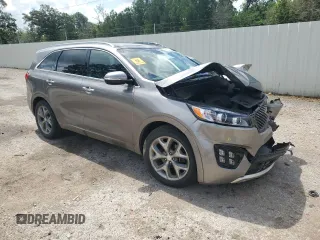 2016 Kia Sorento SXL with VIN 5XYPK4A18GG028124, listed as a Copart auction lot 59665324 with 63,502 mi miles and Salvage Title. Bid and sale history available at carsss.com. Image 4.