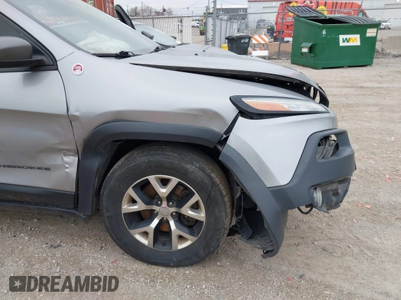 2016 Jeep Cherokee Trailhawk with VIN 1C4PJMBS7GW192574, listed as a IAAI auction lot 41986638 with 144,970 mi miles and . Bid and sale history available at DreamBid. Image 19.