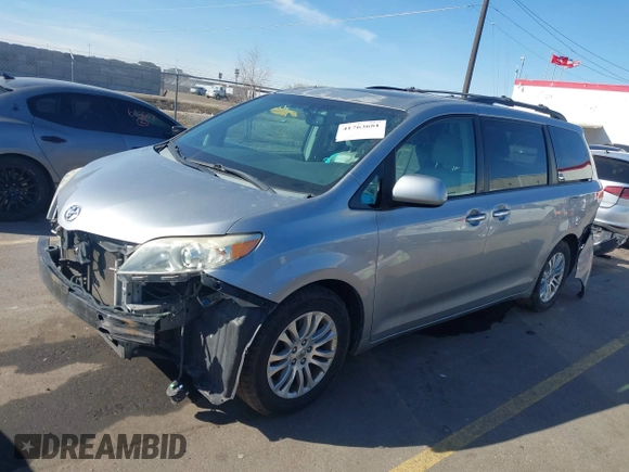 2011 Toyota Sienna XLE AAS with VIN 5TDYK3DC4BS014986, listed as a IAAI auction lot 41763681 with 169,619 mi miles. Bid and sale history available at carsss.com. Image 18.