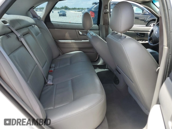 2003 Ford Taurus SES Standard z VIN 1FAFP55U93A162213, wystawiony jako Copart lot #54657645 z przebiegiem 43 756 mil mil oraz Szkoda całkowita • Salvage title. Historia ofert i sprzedaży dostępna na DreamBid. Obrazek 10.