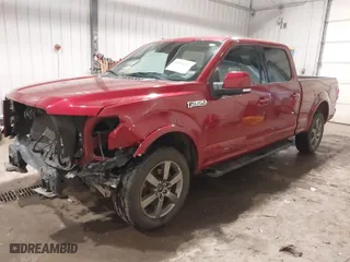 2015 Ford F-150 XLT w/HD Payload Pkg with VIN 1FTFW1EF1FKD80880, listed as a IAAI auction lot 40958352 with 114,911 mi miles. Bid and sale history available at carsss.com. Image 2.