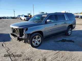 2019 Chevrolet Suburban LT with VIN 1GNSKHKC8KR167205, listed as a Copart auction lot 80579284 with 137,704 mi miles and Salvage title. Bid and sale history available at DreamBid. Image 1.
