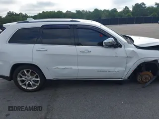 2014 Jeep Grand Cherokee Summit with VIN 1C4RJFJT2EC501235, listed as a IAAI auction lot 42622790 with 160,000 mi miles and . Bid and sale history available at DreamBid. Image 14.