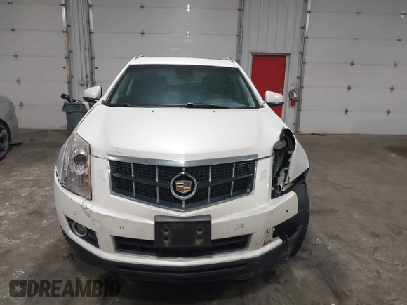2012 Cadillac SRX Premium Collection with VIN 3GYFNFE39CS561614, listed as a IAAI auction lot 42529959 with 59,088 mi miles and . Bid and sale history available at DreamBid. Image 12.