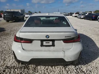 2024 BMW 3 Series 330i with VIN 3MW69FF01R8E55210, listed as a Copart auction lot 84337114 with 0 mi miles and Non Repairable. Bid and sale history available at carsss.com. Image 6.