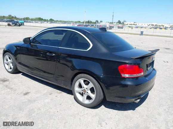 2011 BMW 1 Series 128i with VIN WBAUP7C55BVK78344, listed as a IAAI auction lot 41776367 with 138,351 mi miles. Bid and sale history available at carsss.com. Image 3.