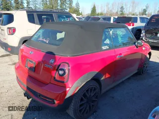 2013 MINI Convertible S with VIN WMWZP3C55DT705938, listed as a IAAI auction lot 41372294 with 118,481 mi miles and . Bid and sale history available at DreamBid. Image 4.