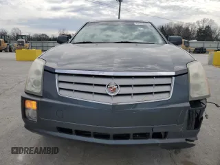 2009 Cadillac SRX RWD z VIN 1GYEE637990137951, wystawiony jako Copart lot #47473825 z przebiegiem 188 592 mil mil oraz Czysty tytuł • Clean title. Historia ofert i sprzedaży dostępna na DreamBid. Obrazek 5.