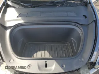 2023 Tesla Model Y Performance with VIN 7SAYGDEF3PF946496, listed as a Copart auction lot 50800315 with 15,077 mi miles and Salvage Title. Bid and sale history available at DreamBid. Image 12.
