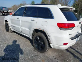 2015 Jeep Grand Cherokee Altitude with VIN 1C4RJFAG1FC797157, listed as a IAAI auction lot 42021139 with 148,491 mi miles. Bid and sale history available at carsss.com. Image 3.
