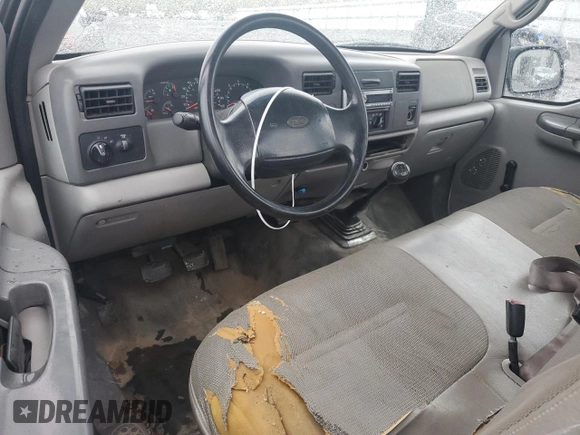 1999 Ford Super Duty F-250 XL with VIN 1FTNF20L0XEA51389, listed as a Copart auction lot 52618635 with 198,767 mi miles and Salvage Title. Bid and sale history available at carsss.com. Image 8.