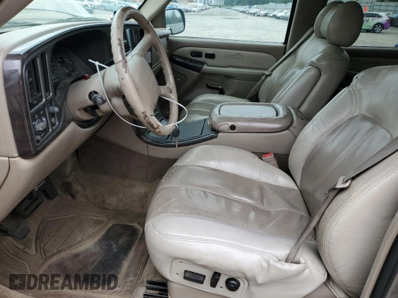 2002 GMC Yukon Denali z VIN 1GKEK63U82J224913, wystawiony jako Copart lot #60664885 z przebiegiem 208 794 mil mil oraz Szkoda całkowita • Salvage title. Historia ofert i sprzedaży dostępna na DreamBid. Obrazek 7.
