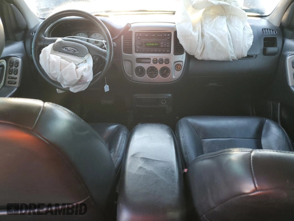 2004 Ford Escape Limited z VIN 1FMCU04184KA70257, wystawiony jako Copart lot #89130575 z przebiegiem 186 430 mil mil oraz Szkoda całkowita • Salvage title. Historia ofert i sprzedaży dostępna na DreamBid. Obrazek 8.