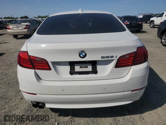 2013 BMW 5 Series 528i with VIN WBAXG5C58DD229195, listed as a Copart auction lot 52193215 with 74,240 mi miles and Salvage Title. Bid and sale history available at carsss.com. Image 6.