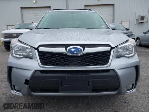 2014 Subaru Forester XT Touring with VIN JF2SJGMC1EH552474, listed as a IAAI auction lot 42461663 with 121,482 mi miles and . Bid and sale history available at DreamBid. Image 12.