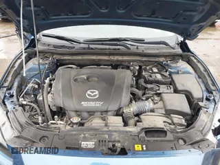 2018 Mazda 3 Touring with VIN 3MZBN1V35JM217641, listed as a IAAI auction lot 41943433 with 64,884 mi miles. Bid and sale history available at carsss.com. Image 10.