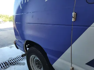 2012 Ford Econoline Cargo Commercial with VIN 1FTNE2EL9CDB21032, listed as a IAAI auction lot 42787135 with 106,406 mi miles and . Bid and sale history available at DreamBid. Image 34.