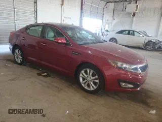 2012 Kia Optima EX with VIN 5XXGN4A77CG053039, listed as a Copart auction lot 48676705 with 114,501 mi miles and Salvage Title. Bid and sale history available at DreamBid. Image 4.