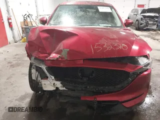 2017 Mazda CX-5 Sport with VIN JM3KFBBL4H0152814, listed as a IAAI auction lot 41487258 with 158,161 mi miles and . Bid and sale history available at DreamBid. Image 6.
