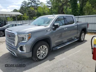 2021 GMC Sierra 1500 Denali z VIN 3GTU9FET1MG248191, wystawiony jako Copart lot #53705155 z przebiegiem 75 665 mil mil oraz Czysty tytuł • Clean title. Historia ofert i sprzedaży dostępna na DreamBid. Obrazek 1.