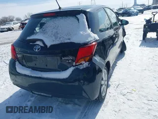 2015 Toyota Yaris L with VIN VNKJTUD34FA055116, listed as a IAAI auction lot 41601874 with 84,508 mi miles. Bid and sale history available at carsss.com. Image 4.