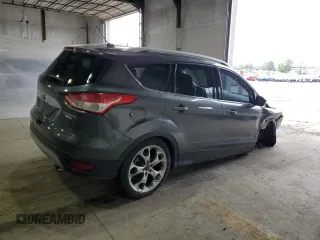 2016 Ford Escape Titanium with VIN 1FMCU9JX9GUB94754, listed as a Copart auction lot 52679435 with 176,075 mi miles and Salvage Title. Bid and sale history available at DreamBid. Image 3.
