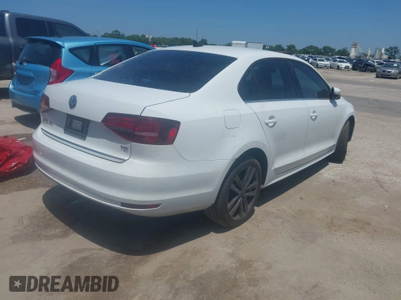 2017 Volkswagen Jetta SEL with VIN 3VWL17AJ3HM410226, listed as a IAAI auction lot 41379536 with 58,448 mi miles and . Bid and sale history available at DreamBid. Image 4.