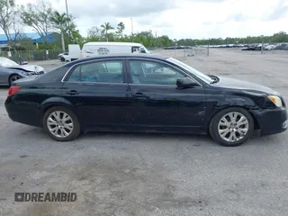 2010 Toyota Avalon XL with VIN 4T1BK3DB1AU353725, listed as a IAAI auction lot 41984608 with 153,759 mi miles and . Bid and sale history available at carsss.com. Image 14.