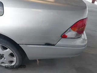 2001 Lexus LS 430 z VIN JTHBN30F210011128, wystawiony jako IAAI lot #41267857 z przebiegiem 451 328 mil mil oraz . Historia ofert i sprzedaży dostępna na DreamBid. Obrazek 14.