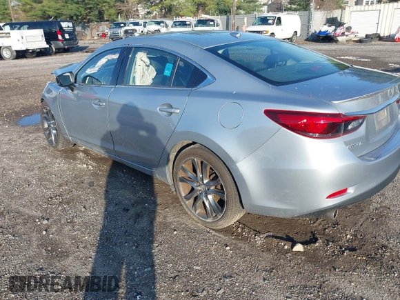 2017 Mazda 6 Grand Touring with VIN JM1GL1W50H1132261, listed as a IAAI auction lot 41930610 with 54,431 mi miles and . Bid and sale history available at DreamBid. Image 3.