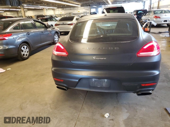 2015 Porsche Panamera 4 z VIN WP0AA2A73FL006102, wystawiony jako Copart lot #58297934 z przebiegiem 101 863 mil mil oraz Szkoda całkowita • Salvage title. Historia ofert i sprzedaży dostępna na DreamBid. Obrazek 6.